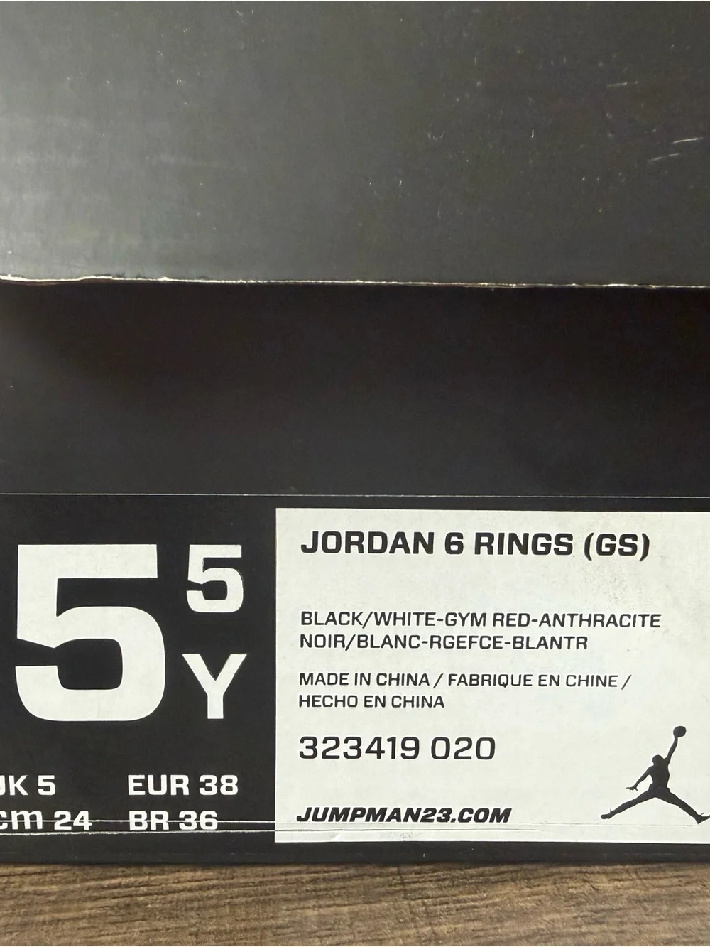 Jordan Kids' Black with Red Accent Basketball Sneakers